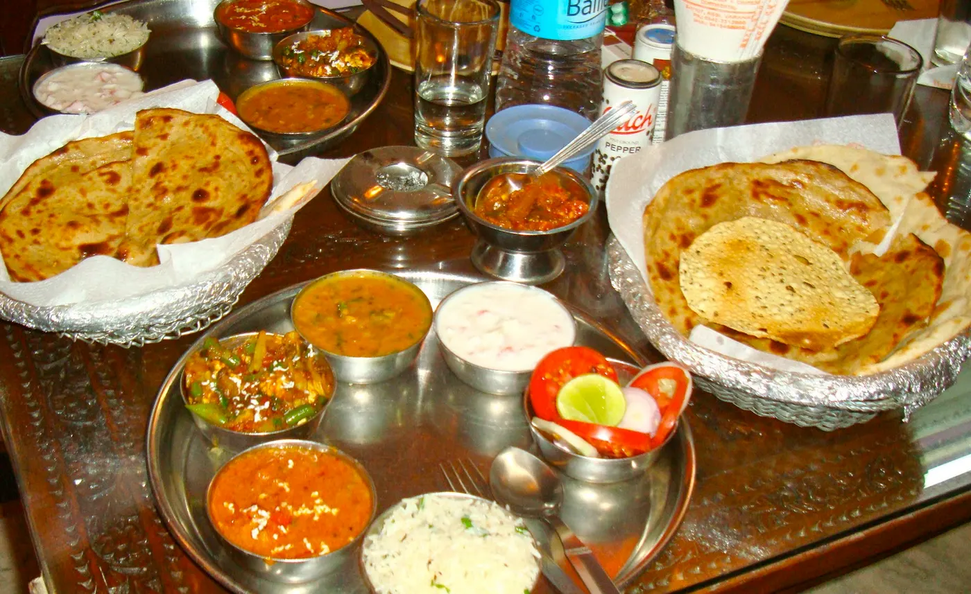In this Nepali daal-bhaat-tarkaari combination, a variety of breads are served in a separate dish.