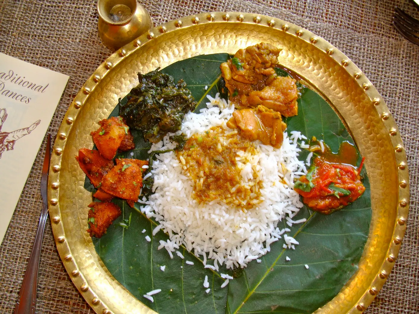 Serving Nepali meal in a plate that is lined with Saal tree leaf (saal ko paat). It gives a beautiful background and adds an exotic touch.