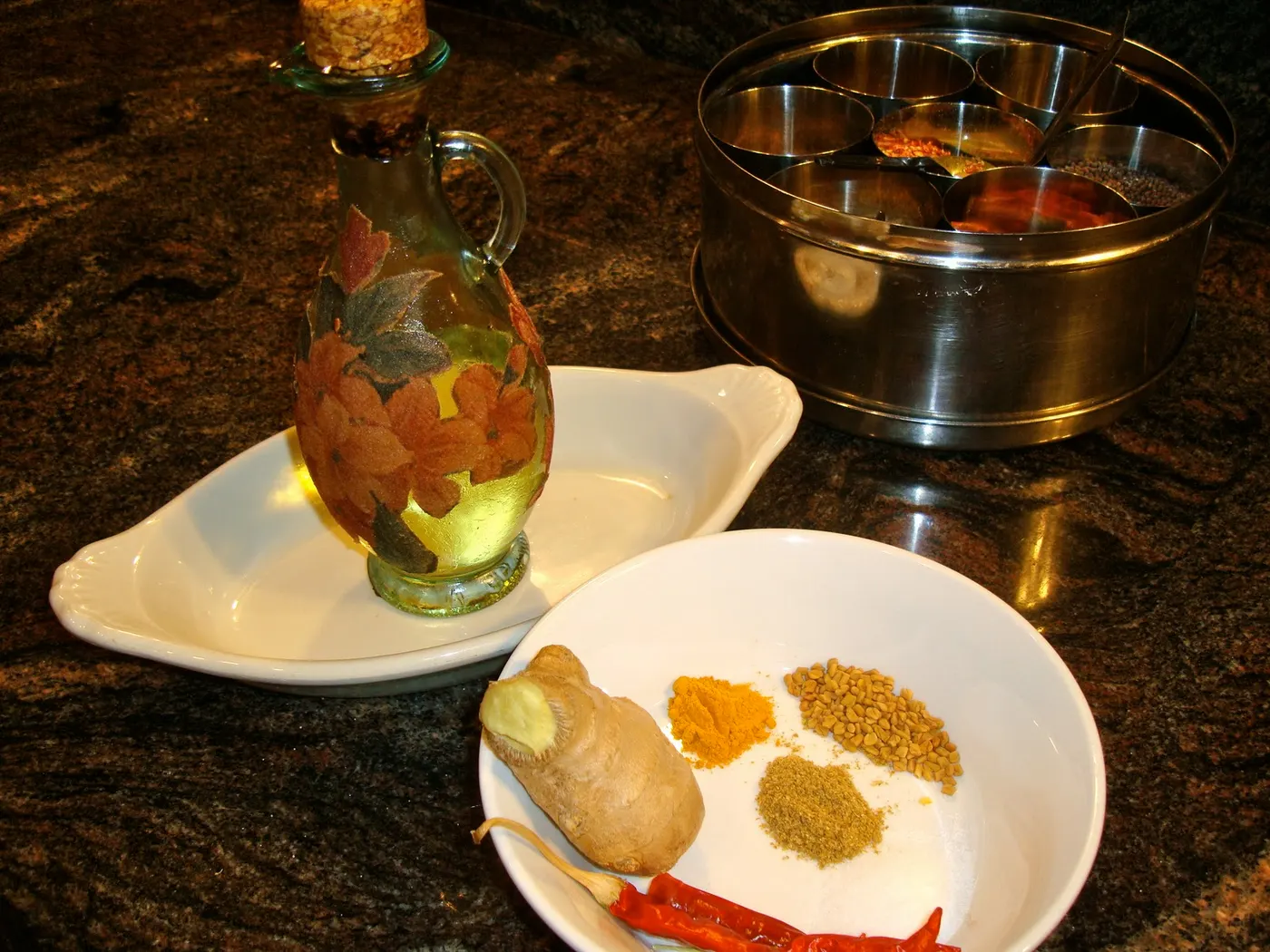 Spices used - dried red chili, fenugreek seeds, ground turmeric, minced fresh ginger and garlic, cumin, and salt.