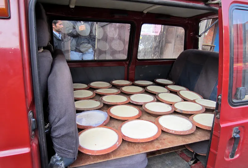 Juju Dhau for sale - transported from Bhaktapur, to Ason Chowk, Kathmandu