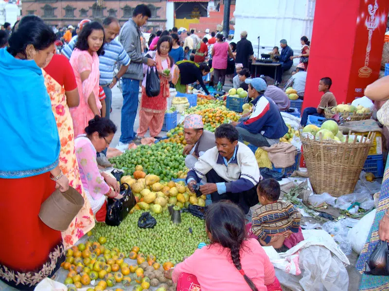 Photo of a busy vegetable market during festival season.