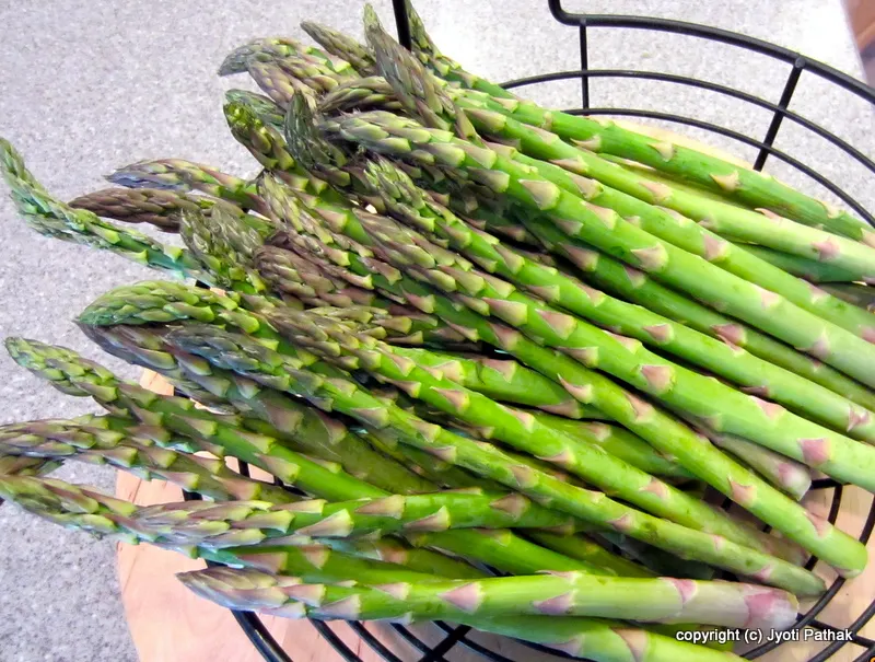 Picking up Asparagus in the spring time (April-May) from my home garden.