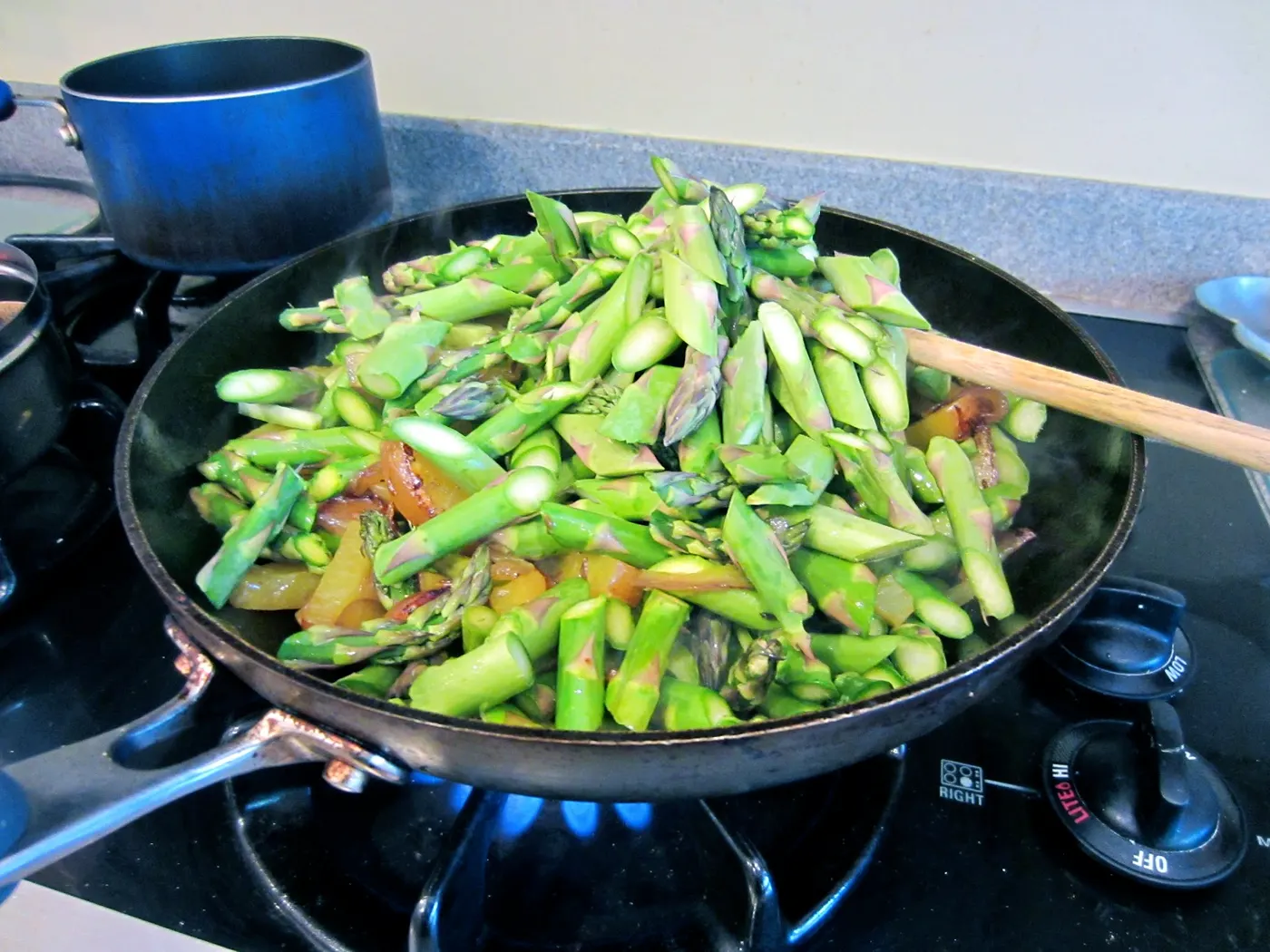 ...and then the asparagus is added and they are cooked together briefly, as freshly harvested spears are so tender they hardly need cooking at all.
