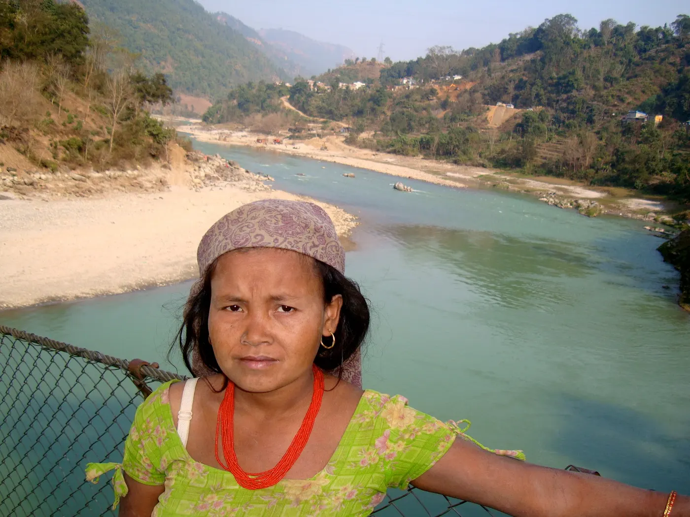 Local village girl of Malekhu is enjoying the natural beauty of Trishuli river.