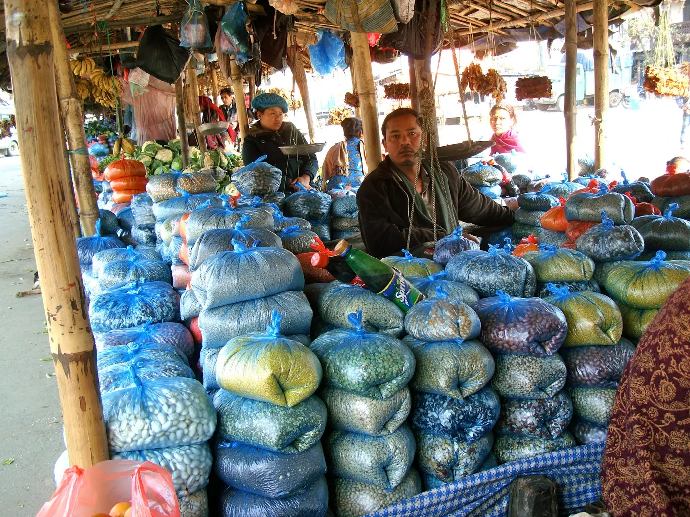 Malekhu village road side stalls are well stocked with dried beans, lentils, and peas along with fresh vegetables.