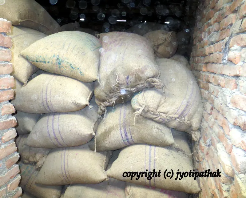 A room filled with Mustard seeds stored in a jute sacks at Everest Tori Mill