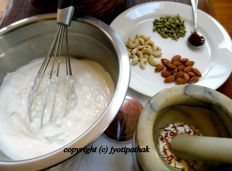 ....removing the collected thickened yogurt and transferring into a bowl - a little lengthy process to drain the whey