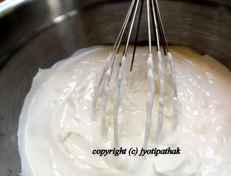 ... the drained yogurt is ready - it should be a little thinner than cream cheese, but thicker than sour cream. Beat the yogurt until well blended, smooth and a little fluffy ...