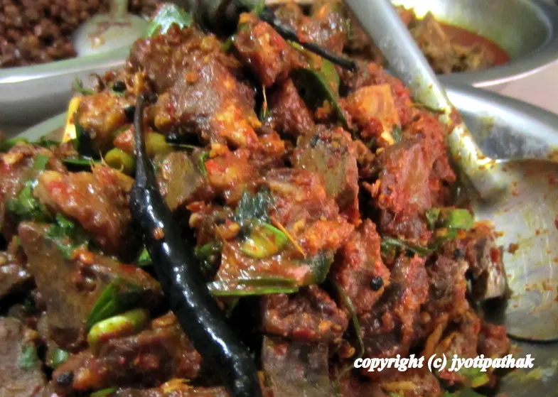 Slow cooked curried goat spiced to perfection