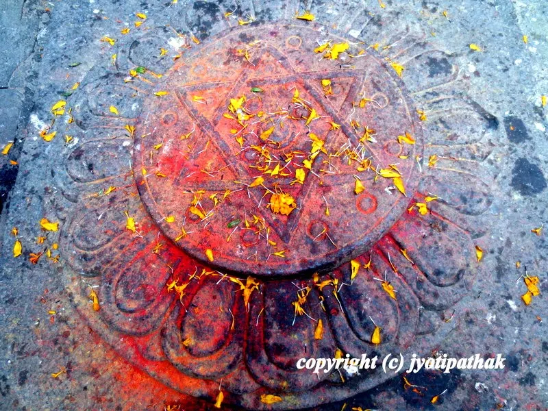 Worshiping the Mandala in the street corner