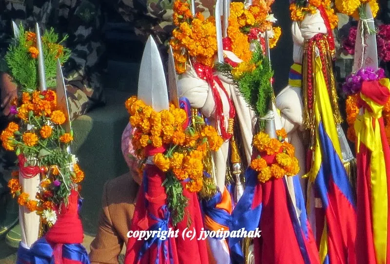 Trying to find a perfect picture taking vista.....worshiping the khukuri, a Nepalese knife with an inwardly curved edge.