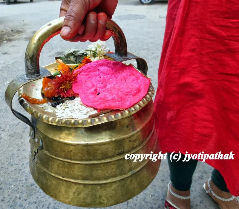 ...spiritual world of Nepal - devotee carrying offerings for god