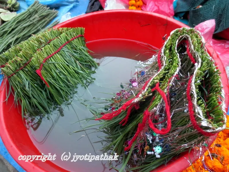 ... another picture of grass garland - on the right with metallic silver zari trim and the left is waiting for a decorative touch.