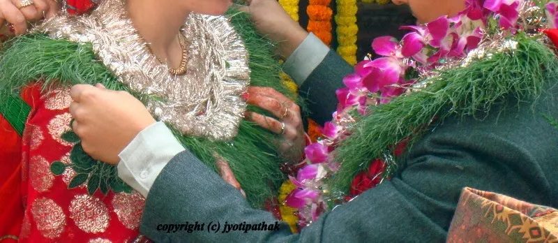 Here is the picture of groom and bride exchanging the dubo ko maalaa during Swayamvar ceremony.