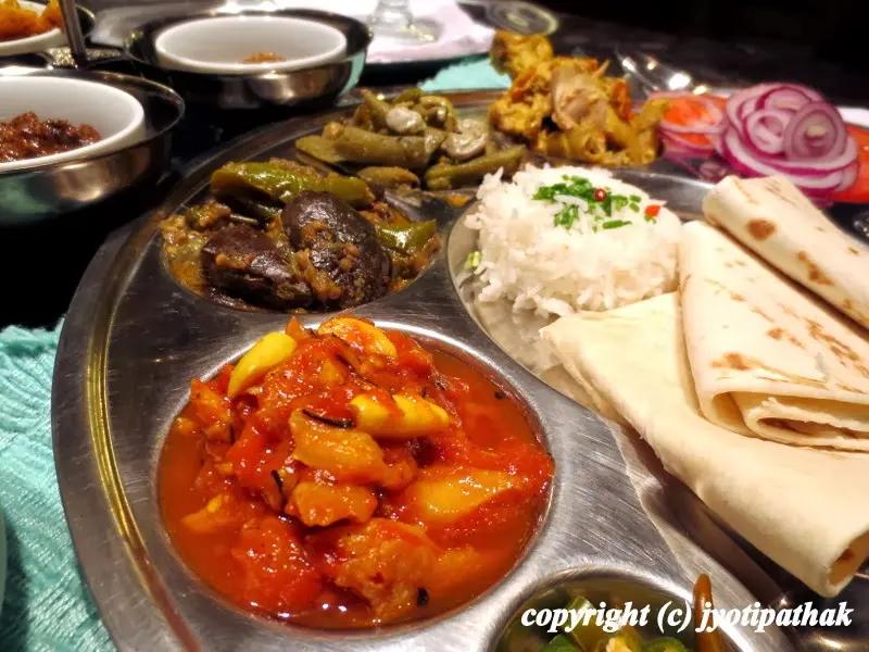 Serving Nepali Daal-Bhaat-Tarkaari with tomato pickle