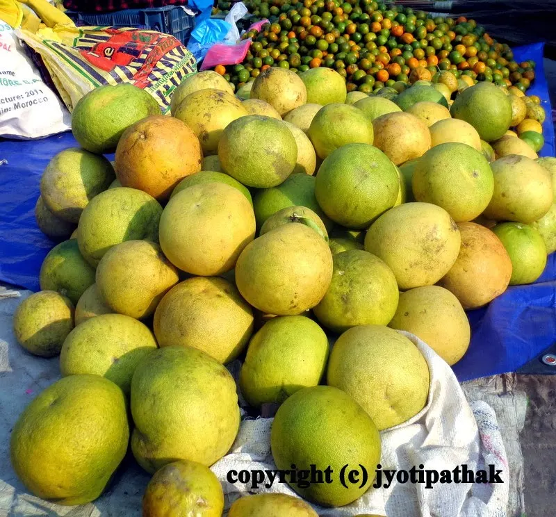 Attention shoppers! High quality fresh pomelo have just arrived in Nepali markets - looks like the pomelos are fighting for attention - and they are destined for a saadeko dish.
