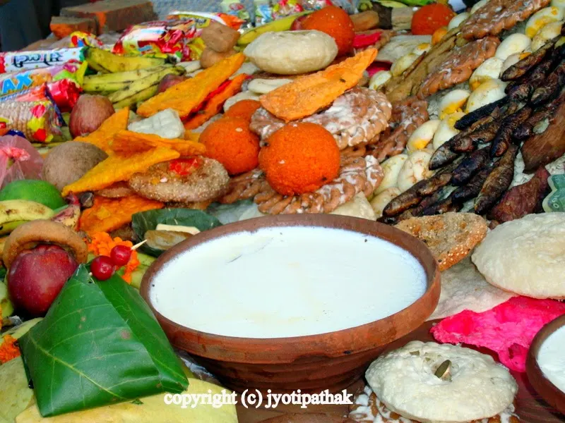 Juju Dhau, the sweetened custard-like yogurt in a red clay container from Bhaktapur, Nepal, is one of the most important component for the feast during the festival.