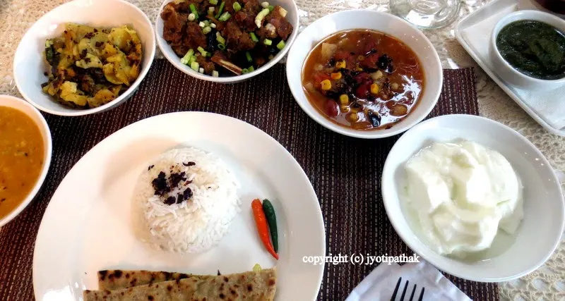 Home cooked traditional Nepali Daal-Bhaat-Tarkaari with a bowl of plain yogurt