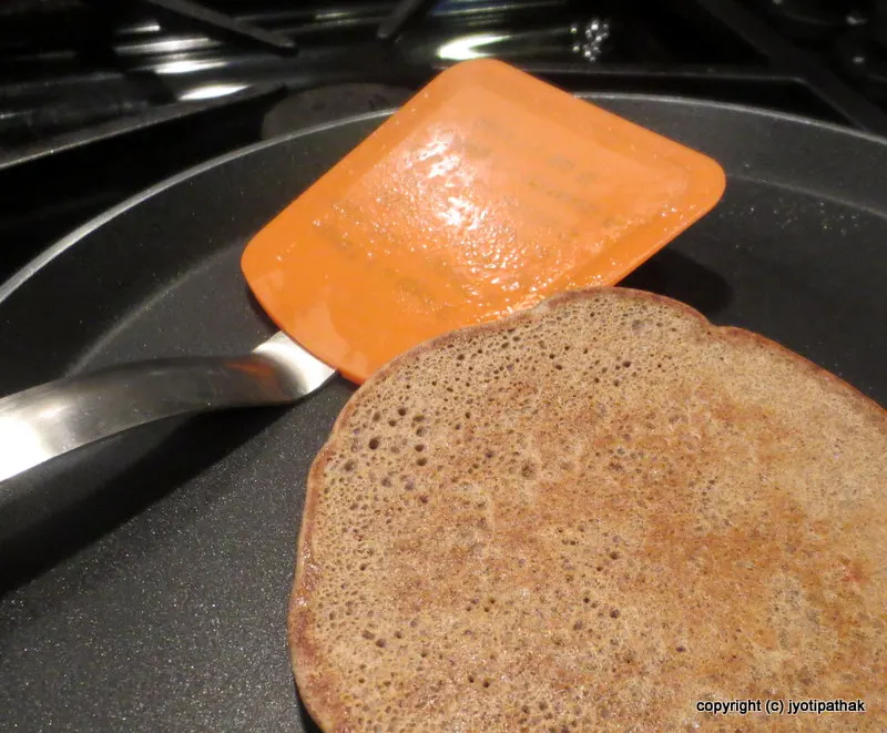 Cooking the other side - add butter and continue cooking until golden brown.
